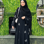 Elegant black abaya with detailed embroidery for a sophisticated and modest look.