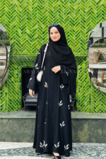 Elegant black abaya with detailed embroidery for a sophisticated and modest look.
