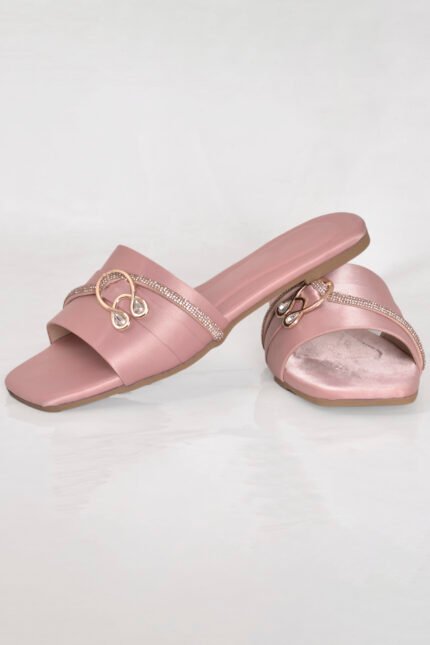 Step into luxury with this beautiful pink women slipper from our premium Z. Collection by Zainab Designer Abaya. Crafted with a soft satin-textured upper, delicate crystal detailing, and a gold decorative mono, this slipper is perfect for formal events, casual wear, and everything in between.