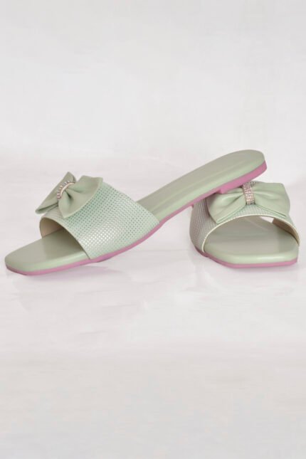 This light grape-colored formal women slipper is perfect for those who love simplicity with a hint of sparkle. The bow-style upper is paired with delicate crystal detailing to create a classy yet playful look. Whether you're at home, out for shopping, or attending a casual event, this slipper keeps you looking fresh and feminine.