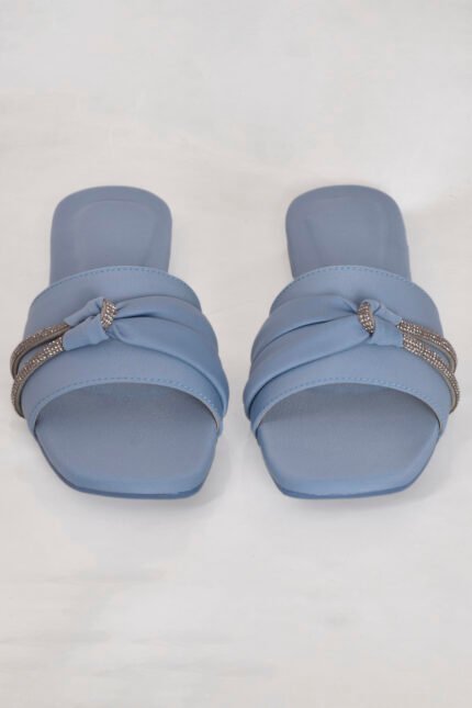 Blue shade formal women slipper featuring a cross twist strap and subtle stone work. A chic, graceful pick from the Z. Collection — stylish, comfortable, and affordable
