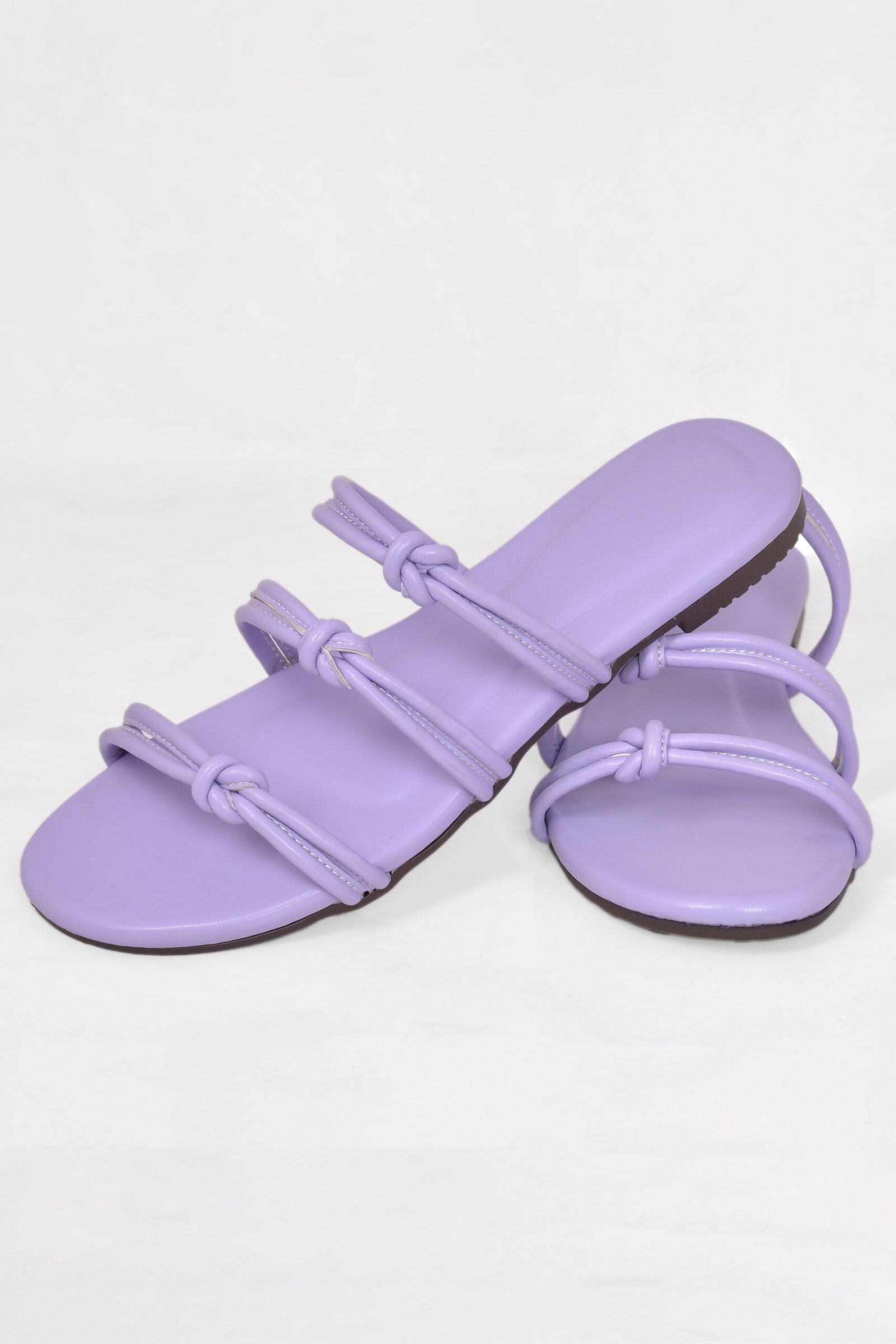 Women Slipper Women Slipper in kasani color with twist knot straps. Soft, lightweight, and trendy — a perfect pick from the Z. Collection by Zainab Designer Abaya. Comfortable for daily wear and stylish enough to stand out.