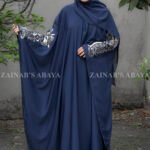 Navy Blue Kaftan Abaya with Embroidery on Front Sleeves and Backside with a matching color scarf a motif on it