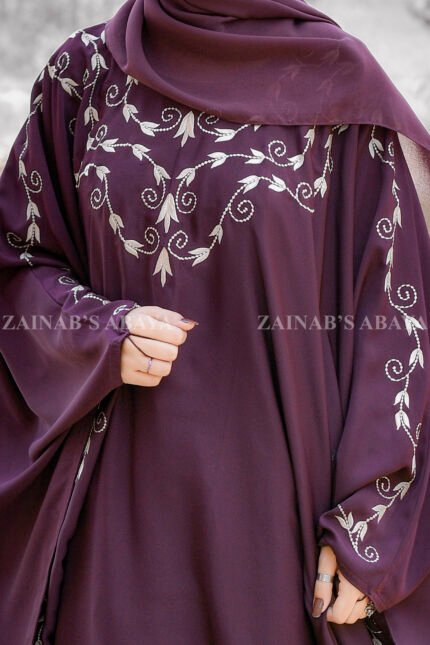 Kaftan Abaya in Nida Korean Fabric with embroidery on front neck and border as well as same color scarf with motive on it.