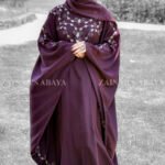 Kaftan Abaya in Nida Korean Fabric with embroidery on front neck and border as well as same color scarf with motive on it.