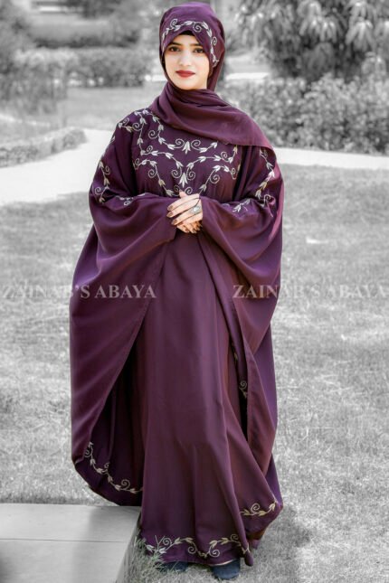 Kaftan Abaya in Nida Korean Fabric with embroidery on front neck and border as well as same color scarf with motive on it.