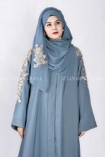 Front Open Abaya in Nida Korean Fabric with Embroidery design on sleeves and backside as well as a motif on the scarf.