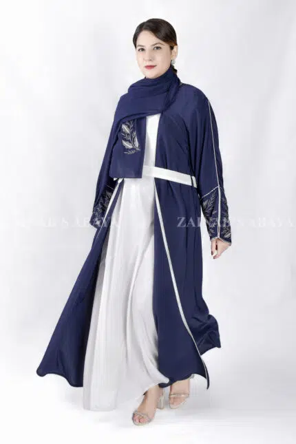 Gown Abaya in Nida Korean Fabric featuring the elegant embroidery on the sleeve ends and inner white gown.