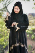 Black Maxi Abaya with Elegant Embroidery on Front, Sleeves Ends and a Zip on Neck as well as fined embroidery line on neck