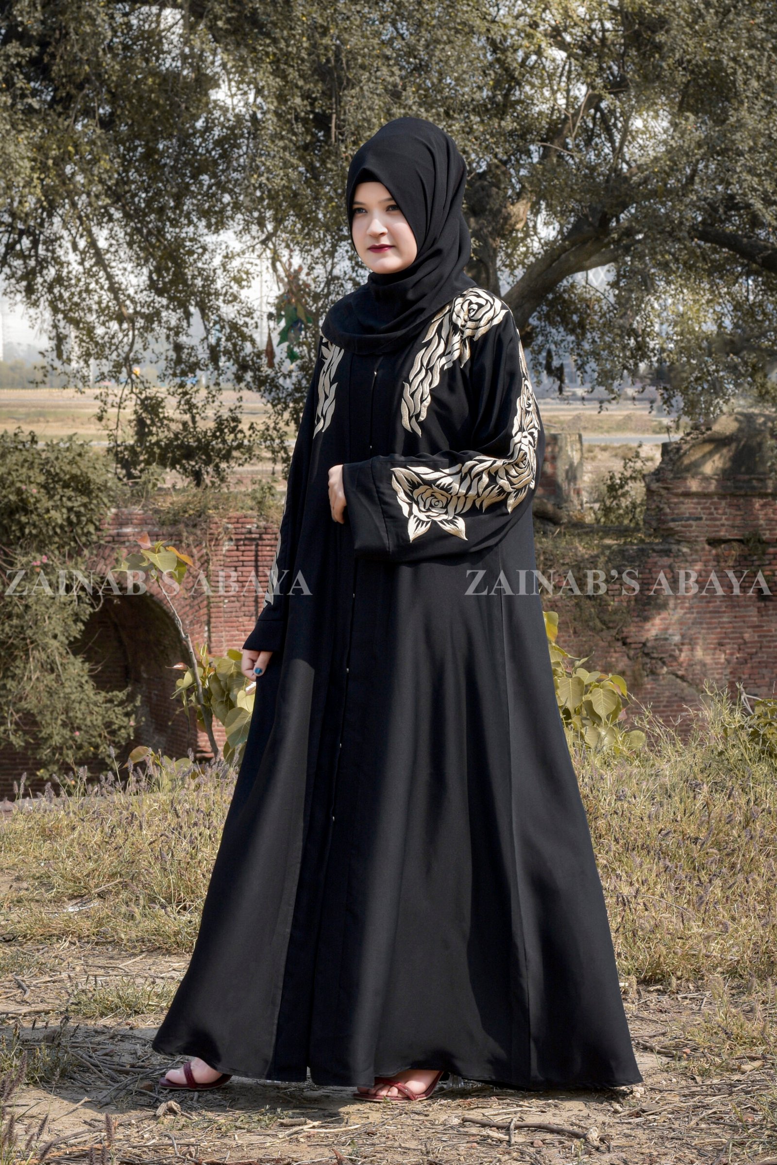 Front Open Abaya - Zainab Designer Abaya Black Front Open Abaya in Nida Korean Fabric with Sleek Designed Embroidery as well as motif on scarf.