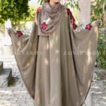 Skin colored kaftan abaya in nida korean fabric with embroidery in floarl style and in red or golden color combination