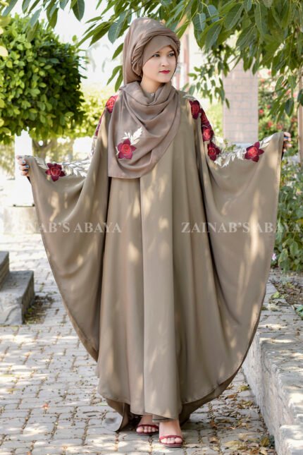 Skin colored kaftan abaya in nida korean fabric with embroidery in floarl style and in red or golden color combination