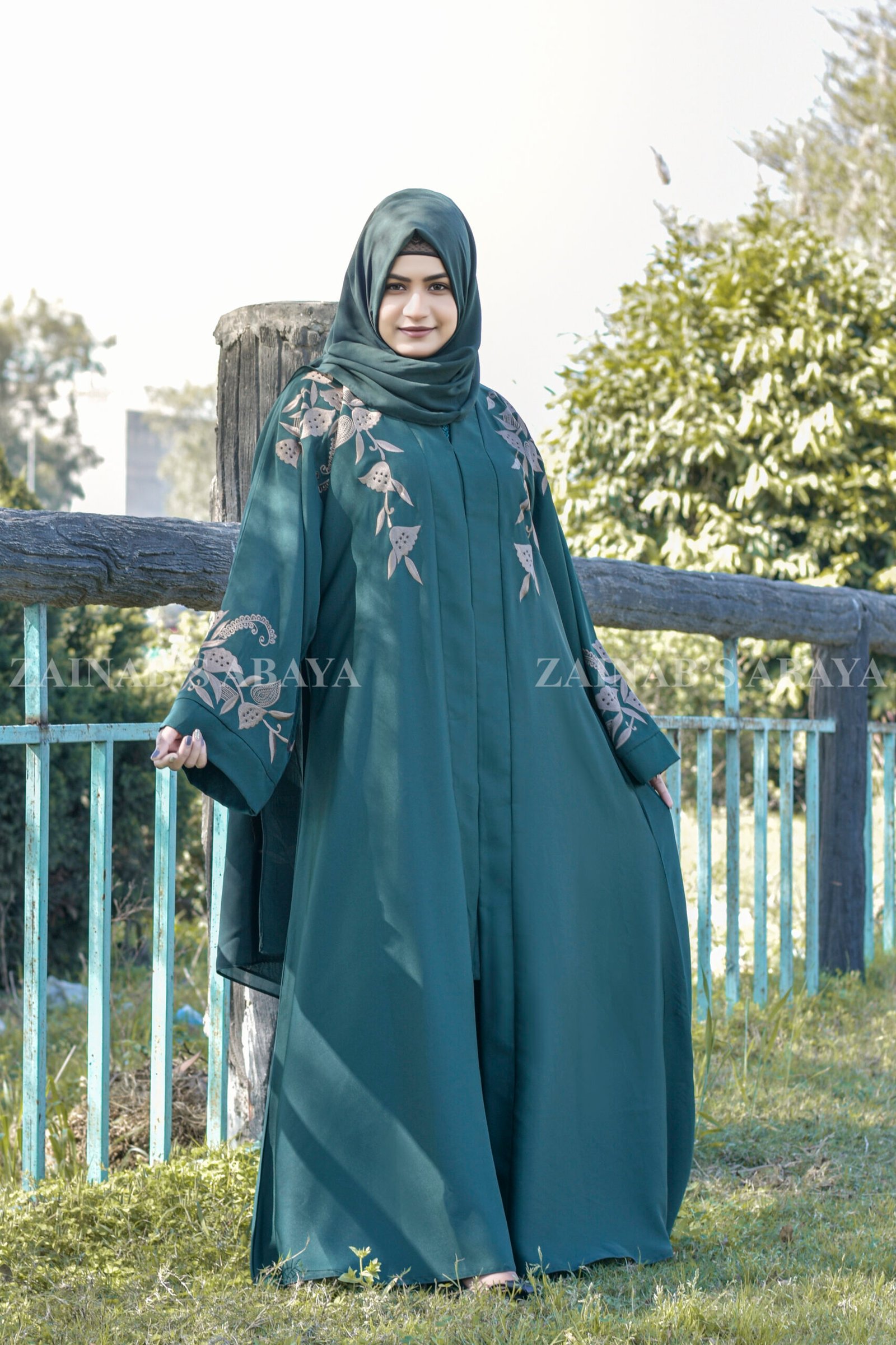 Front Open Abaya - Zainab Designer Abaya Front Open Abaya in Nida Korean with Embroidery on front and sleeve cuffs as well as motive on the scarf.