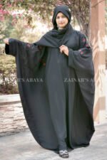 Black Kaftan Abaya in Nida Korean Fabric with Embroidery on sleeves and motif on scarf as well.