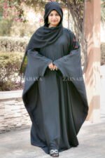 Black Kaftan Abaya in Nida Korean Fabric with Embroidery on sleeves and motif on scarf as well.