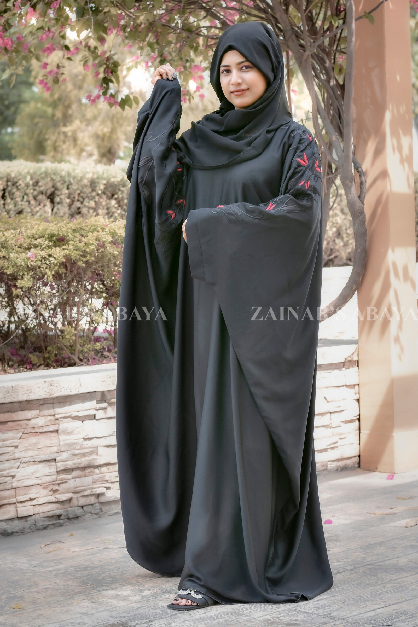 Kaftan Abaya - Zainab Designer Abaya Black Kaftan Abaya in Nida Korean Fabric with Embroidery on sleeves and motif on scarf as well.