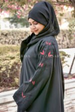 Black Kaftan Abaya in Nida Korean Fabric with Embroidery on sleeves and motif on scarf as well.