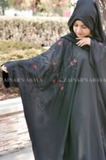 Black Kaftan Abaya in Nida Korean Fabric with Embroidery on sleeves and motif on scarf as well.