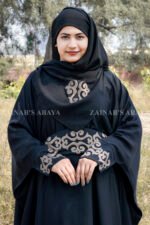 Nida Kaftan Abaya with Embroidery on Sleeves ends and on Belt with same color scarf motif with same embroidery pattern.
