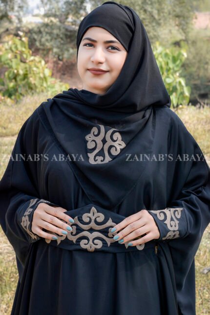 Nida Kaftan Abaya with Embroidery on Sleeves ends and on Belt with same color scarf motif with same embroidery pattern.