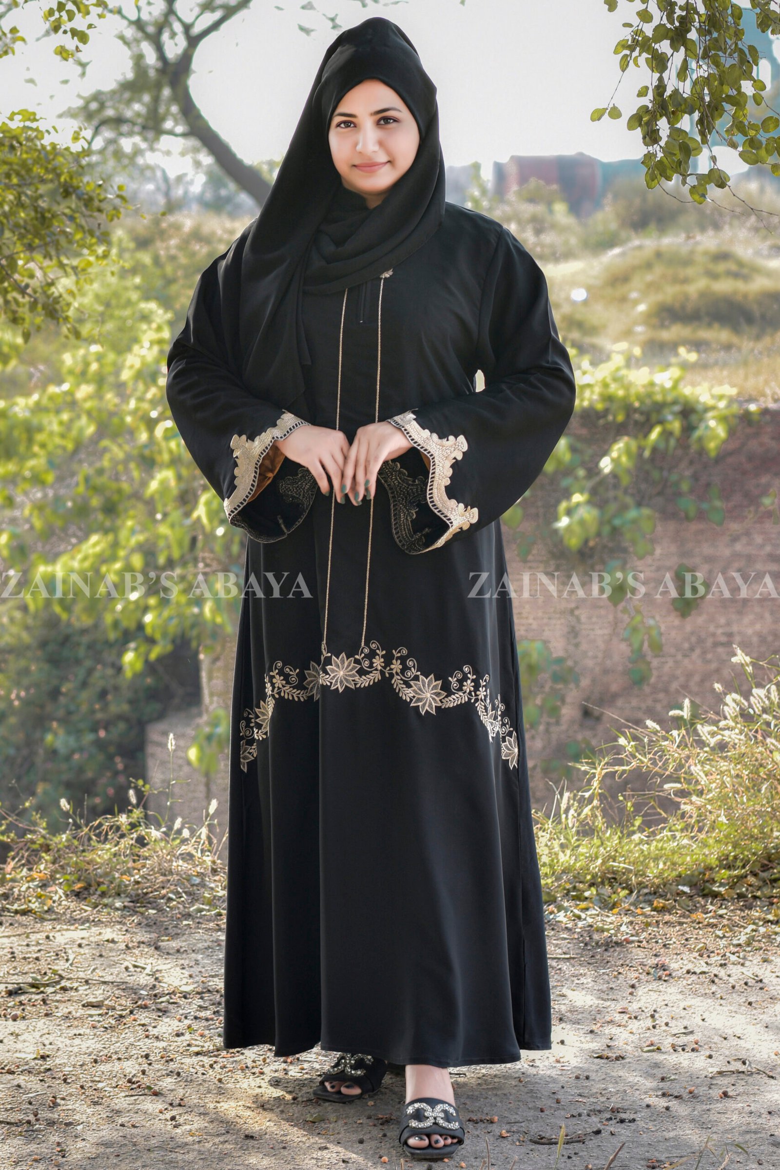 Maxi Abaya - Zainab Designer Abaya Black Maxi Abaya with Elegant Embroidery on Front, Sleeves Ends and a Zip on Neck as well as fined embroidery line on neck