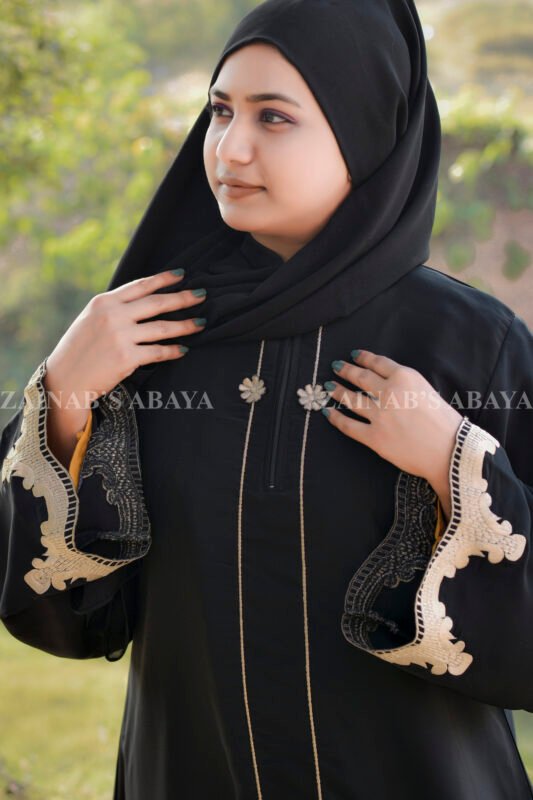 Black Maxi Abaya with Elegant Embroidery on Front, Sleeves Ends and a Zip on Neck as well as fined embroidery line on neck