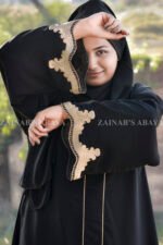 Black Maxi Abaya with Elegant Embroidery on Front, Sleeves Ends and a Zip on Neck as well as fined embroidery line on neck