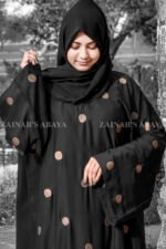 Black Maxi Abaya with Embroidery on Front and Sleeves as well as motif on scarf.