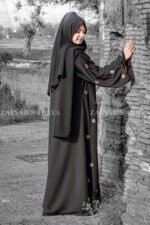 Black Maxi Abaya with Embroidery on Front and Sleeves as well as motif on scarf.