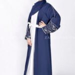 Gown Abaya in Nida Korean Fabric featuring the elegant embroidery on the sleeve ends and inner white gown.