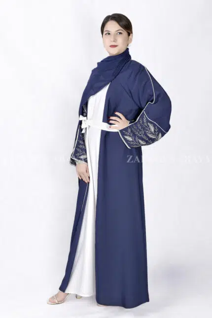 Gown Abaya in Nida Korean Fabric featuring the elegant embroidery on the sleeve ends and inner white gown.