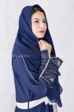 Gown Abaya in Nida Korean Fabric featuring the elegant embroidery on the sleeve ends and inner white gown.