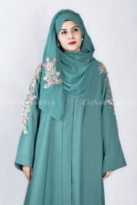 Front Open Abaya in Nida Korean Fabric with Embroidery design on sleeves and backside as well as a motif on the scarf.