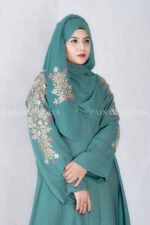 Front Open Abaya in Nida Korean Fabric with Embroidery design on sleeves and backside as well as a motif on the scarf.