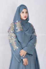 Front Open Abaya in Nida Korean Fabric with Embroidery design on sleeves and backside as well as a motif on the scarf.
