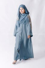 Front Open Abaya in Nida Korean Fabric with Embroidery design on sleeves and backside as well as a motif on the scarf.
