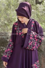 Umbrella Abaya in Nida Korean Fabric with Elegant Embroidery Style on Upper Front, Mid one side, at Sleeves and motive on the scarf.