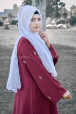 Nida Double Gown Abaya with Embroidery in Moon Light Style at Sleeves and motives on the scarf.