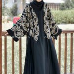 Black Front Open Abaya with Embroidery on Front and Sleeves as well as matching scarf in chiffon fabric.