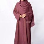 Front Open Abaya in Single Chiffon Fabric and the color is T.Pink with a matching scarf.
