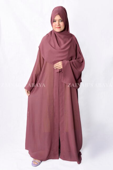 Front Open Abaya in Single Chiffon Fabric and the color is T.Pink with a matching scarf.