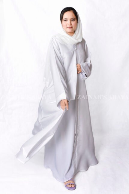 Front Open Abaya which is crafted in shamooz fabric with a matching scarf in chiffon fabric.