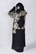 Nida Black Front Open Abaya with embroidery embellishment on front, back, sleeves, and motif on the scarf which is in chiffon fabric.