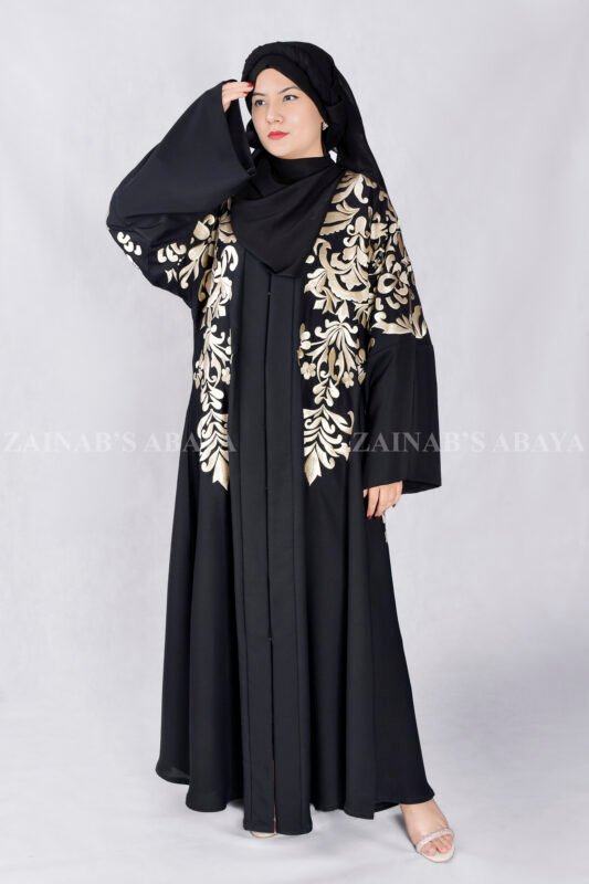 Nida Black Front Open Abaya with Embroidery Embellishment on Front, Back, Sleeves, and motif on the Scarf which is in Chiffon Fabric.