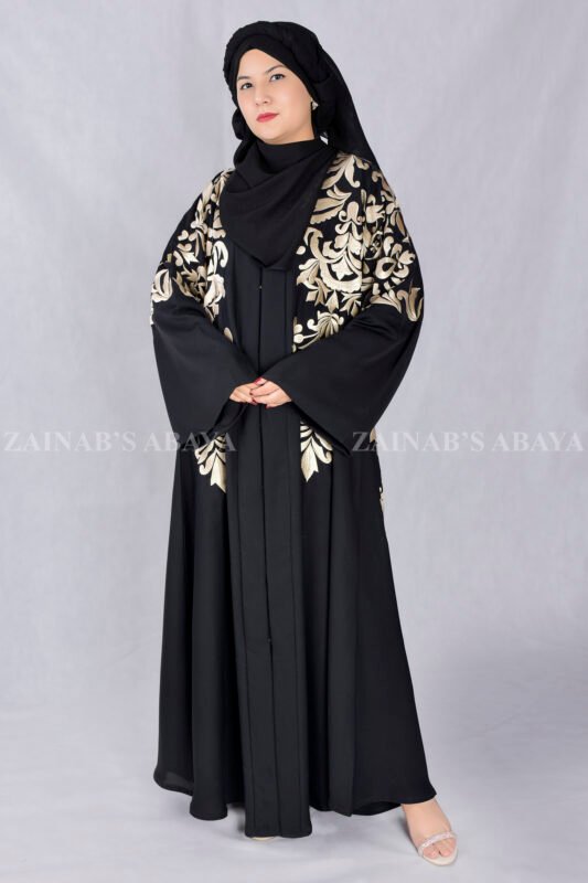 Nida Black Front Open Abaya with Embroidery Embellishment on Front, Back, Sleeves and motif on the scarf which is in Chiffon Fabric.