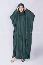 Kaftan Abaya in Dual Layer Chiffon Fabric with Plated Style on Front and Stone Embellishment at Shoulders and Sleeve Cuffs as well as a matching scarf in Chiffon Fabric.