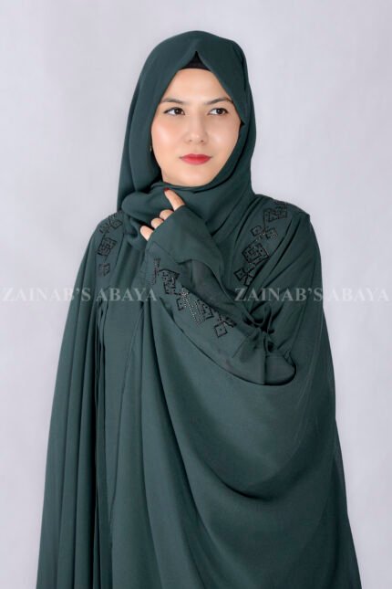 Kaftan Abaya in Double Layer Chiffon Fabric with Plated Style on Front and Stone Embellishment at Shoulders and Sleeve Cuffs as well as a matching scarf in Chiffon Fabric.