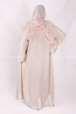 Front Open Abaya in Peach Color is crafted in Premium Nida Korean fabric featuring the stylish embroidery at all around bottom, sleeves and motif on the scarf in same embroidery pattern which is in chiffon fabric.