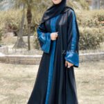 Black Front Open Abaya in Nida Korean Fabric with double colored strap and a matching scarf in chiffon fabric.