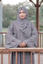 Front Open Abaya which is crafted in Nida Korean Fabric featuring the dual layer sleeves and pearl work on it as well as on scarf which is in chiffon fabric.